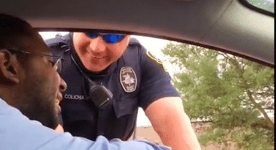 This man was stopped by the police because he did not have the child in the car seat.