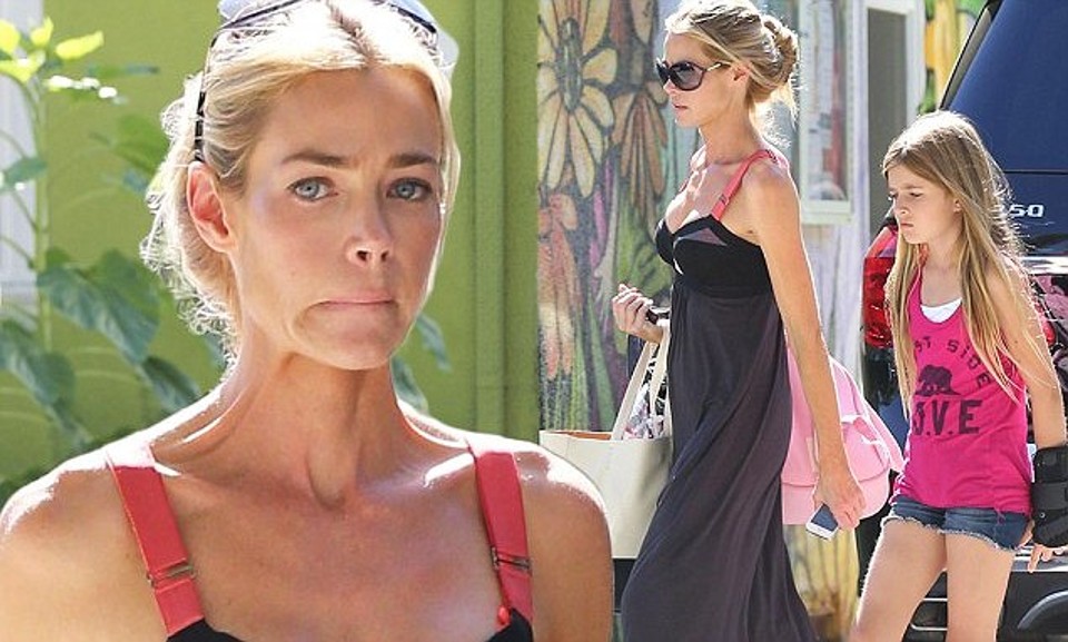 Denise Richards, overwhelmed with emotion, delivers the announcement.
